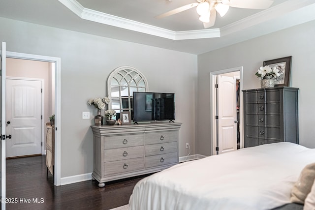 180 Cashew Loop, Cameron, NC 28326 - bedroom featuring ornamental molding, baseboards, dark wood-type flooring, a tray ceiling, and a ceiling fan