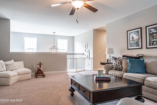 180 Cashew Loop, Cameron, NC 28326 - living area featuring baseboards, ceiling fan, and carpet flooring