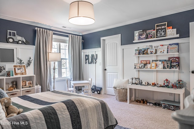 180 Cashew Loop, Cameron, NC 28326 - bedroom with ornamental molding, a decorative wall, carpet flooring, and a wainscoted wall