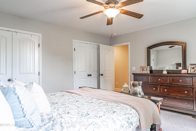 180 Cashew Loop, Cameron, NC 28326 - carpeted bedroom featuring two closets and a ceiling fan