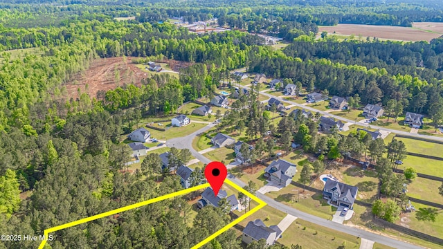 180 Cashew Loop, Cameron, NC 28326 - aerial view featuring a view of trees