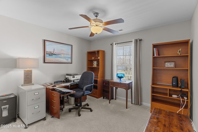 office area with ceiling fan and light colored carpet