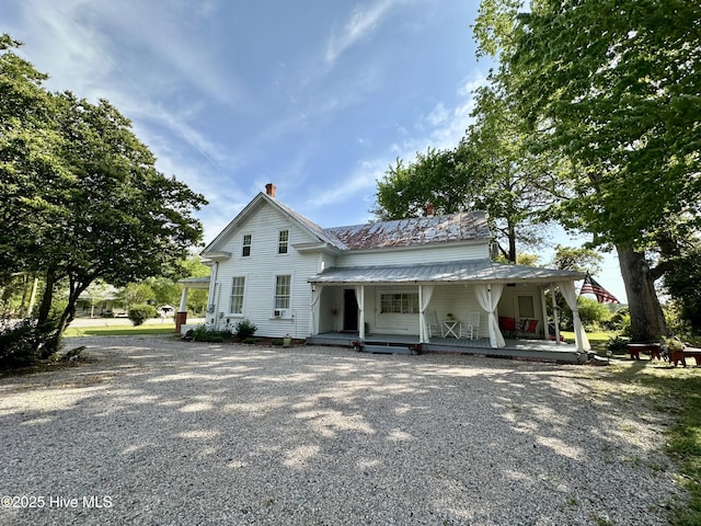 11550 NC Highway 32 N, Roper, NC 27970 - view of front of house featuring a chimney, a porch, and gravel driveway