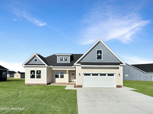 GEORGETOWN Spinnaker Dr, Elizabeth City, NC 27909 - craftsman inspired home with roof with shingles, a front lawn, a garage, and concrete driveway