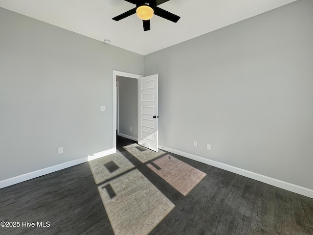GEORGETOWN Spinnaker Dr, Elizabeth City, NC 27909 - unfurnished room featuring dark wood-type flooring, baseboards, and a ceiling fan