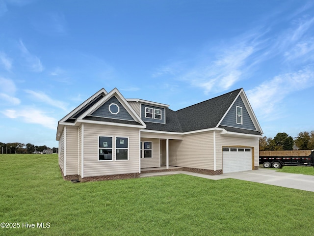 GEORGETOWN Spinnaker Dr, Elizabeth City, NC 27909 - craftsman-style house with roof with shingles, driveway, and a front lawn