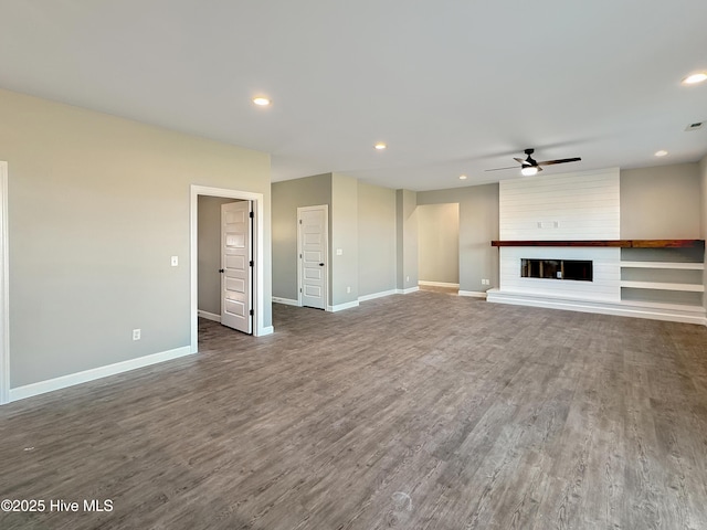 GEORGETOWN Spinnaker Dr, Elizabeth City, NC 27909 - unfurnished living room with dark wood-type flooring, baseboards, a ceiling fan, and recessed lighting