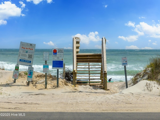 exterior space featuring a beach view