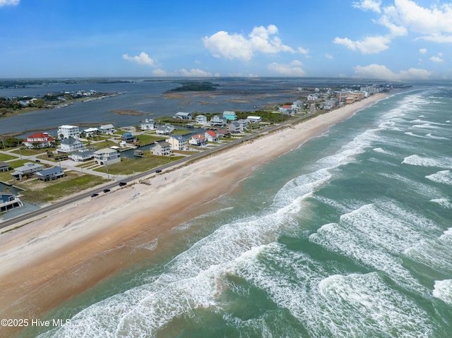 aerial view featuring a beach view and a water view