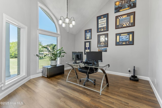 111 Waterway Ct, Aydlett, NC 27916 - office area featuring baseboards, dark wood finished floors, a chandelier, and high vaulted ceiling