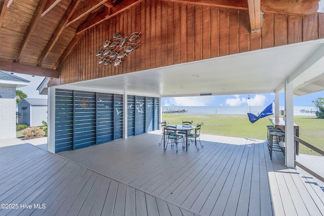 111 Waterway Ct, Aydlett, NC 27916 - wooden terrace featuring a lawn, a water view, and outdoor dining area
