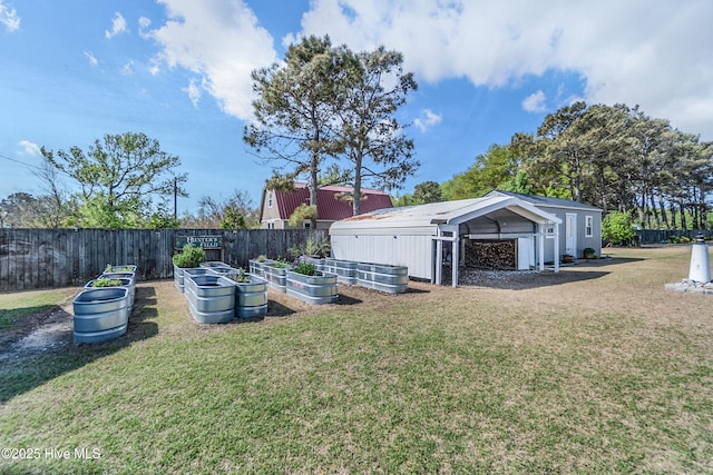 111 Waterway Ct, Aydlett, NC 27916 - view of yard featuring fence and a vegetable garden
