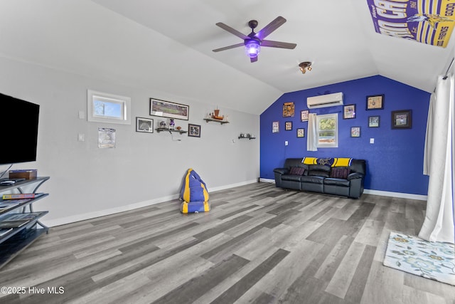 111 Waterway Ct, Aydlett, NC 27916 - game room featuring a ceiling fan, baseboards, wood finished floors, lofted ceiling, and a wall mounted AC