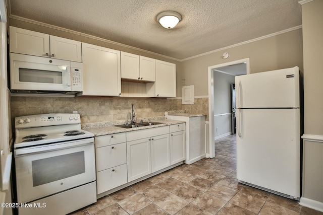 kitchen featuring white appliances, a sink, a textured ceiling, and ornamental molding