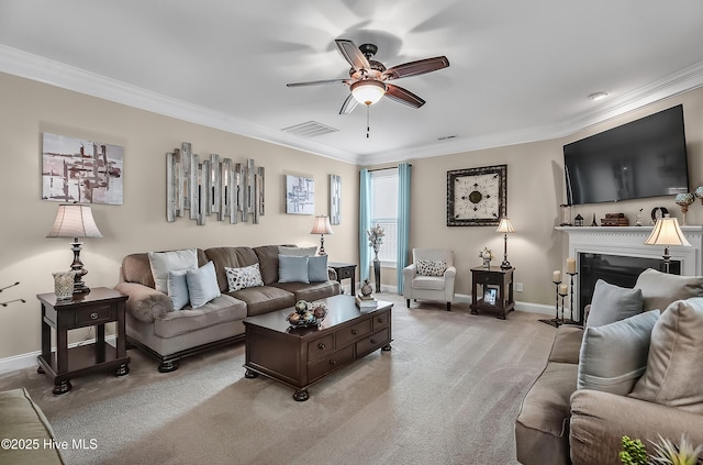 6509 Fawn Settle Dr, Wilmington, NC 28409 - living room with a ceiling fan, ornamental molding, light carpet, and a fireplace with raised hearth