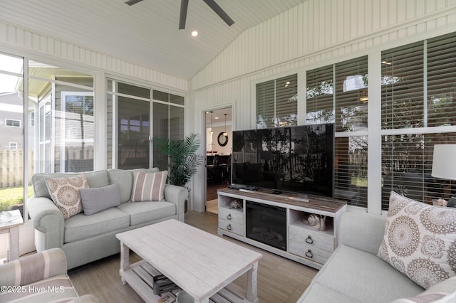 6509 Fawn Settle Dr, Wilmington, NC 28409 - sunroom / solarium featuring lofted ceiling, an outdoor hangout area, and ceiling fan