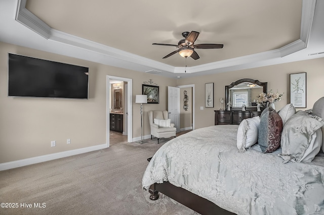 6509 Fawn Settle Dr, Wilmington, NC 28409 - bedroom featuring a raised ceiling, ornamental molding, light carpet, ceiling fan, and ensuite bath
