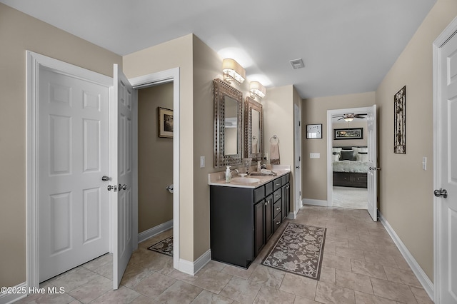 6509 Fawn Settle Dr, Wilmington, NC 28409 - full bath featuring connected bathroom, double vanity, and a ceiling fan