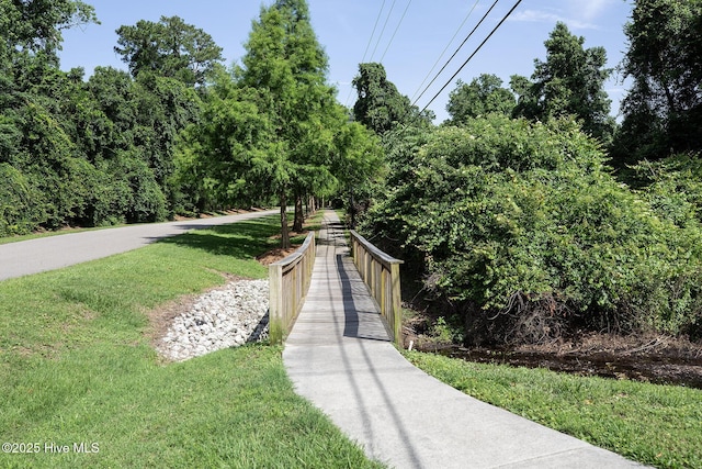 6509 Fawn Settle Dr, Wilmington, NC 28409 - view of property's community with a lawn