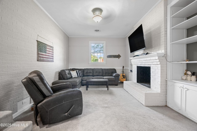 1401 W Queen St, Edenton, NC 27932 - living room featuring a fireplace, carpet, crown molding, and a ceiling fan