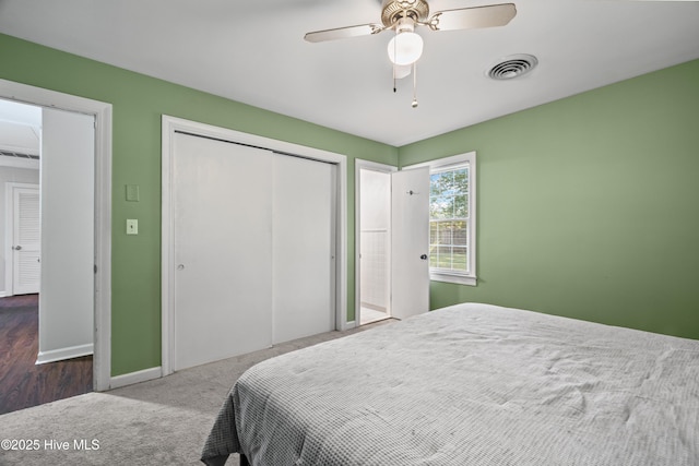 1401 W Queen St, Edenton, NC 27932 - carpeted bedroom with baseboards, a ceiling fan, visible vents, and a closet