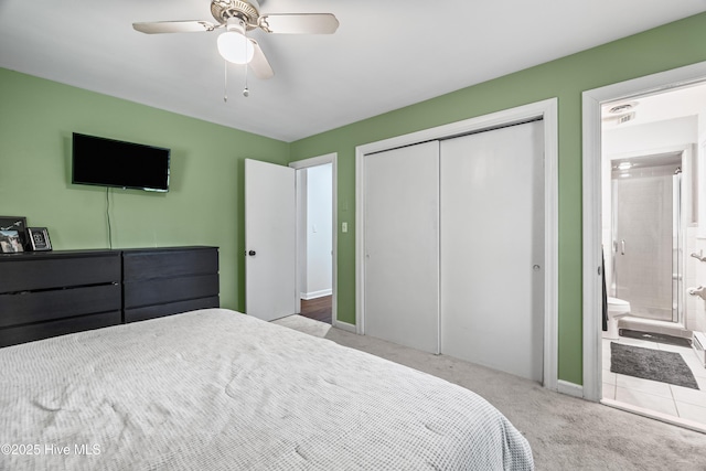 1401 W Queen St, Edenton, NC 27932 - carpeted bedroom with a closet, a ceiling fan, and ensuite bathroom