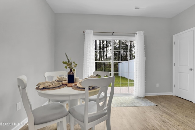 141 Beacon Woods Dr, Holly Ridge, NC 28445 - dining area featuring wood finished floors and baseboards
