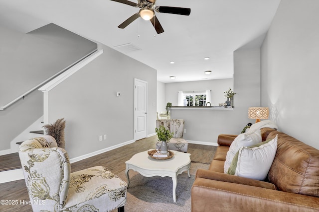 141 Beacon Woods Dr, Holly Ridge, NC 28445 - living room with wood finished floors, ceiling fan, stairs, baseboards, and recessed lighting