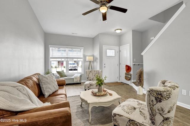 141 Beacon Woods Dr, Holly Ridge, NC 28445 - living room with wood finished floors, a ceiling fan, and baseboards