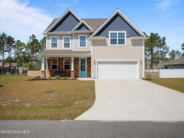 153 Ballantine Grove Ln, Newport, NC 28570 - craftsman house featuring a garage, concrete driveway, and covered porch
