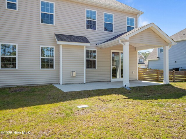 153 Ballantine Grove Ln, Newport, NC 28570 - back of property with a patio and a shingled roof
