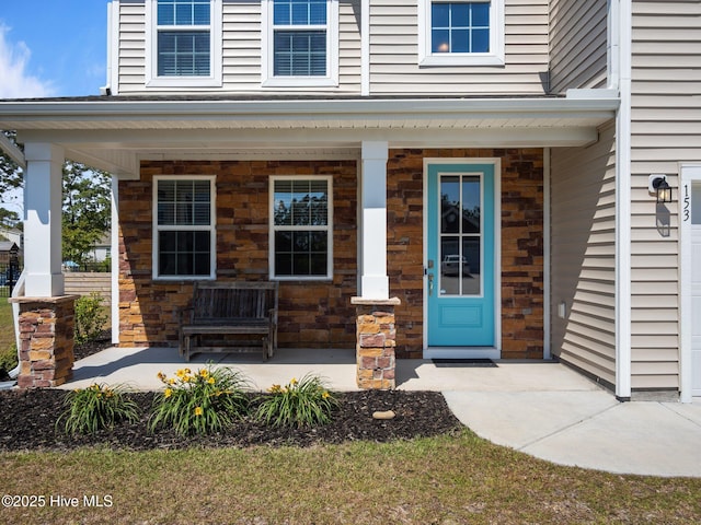 153 Ballantine Grove Ln, Newport, NC 28570 - entrance to property with covered porch and stone siding