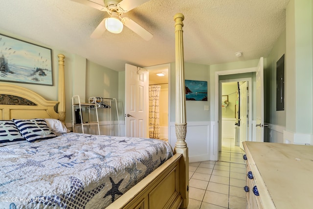 bedroom with carpet flooring, a textured ceiling, and ceiling fan