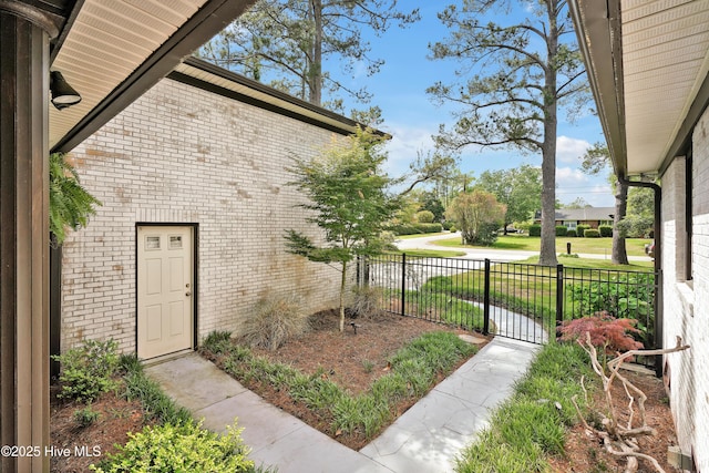 entrance to property with brick siding