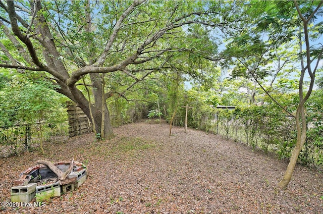 view of yard with fence