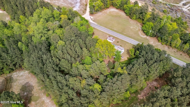 bird's eye view featuring a view of trees
