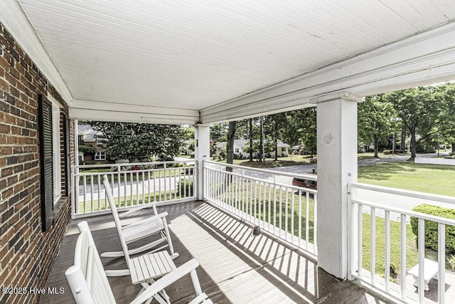300 Moye Ave NW, Wilson, NC 27893 - wooden porch with a yard