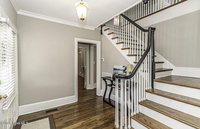 300 Moye Ave NW, Wilson, NC 27893 - foyer with stairway, wood finished floors, and ornamental molding