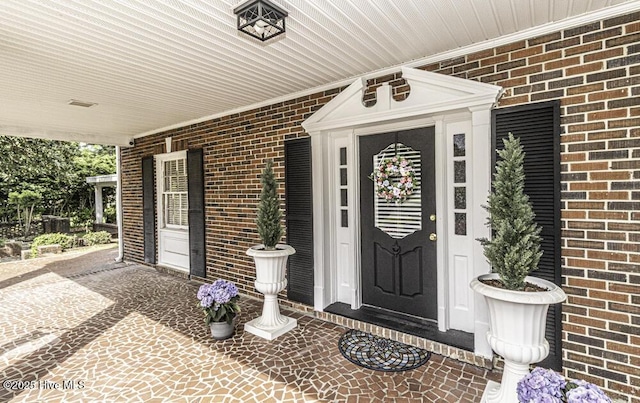 300 Moye Ave NW, Wilson, NC 27893 - entrance to property with brick siding and covered porch