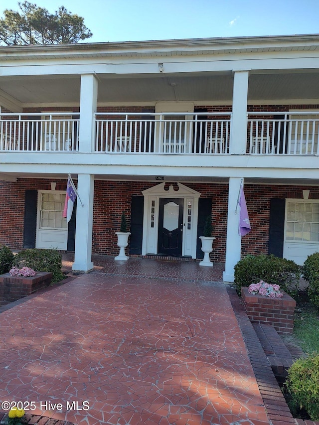 300 Moye Ave NW, Wilson, NC 27893 - view of front of property featuring brick siding and a balcony