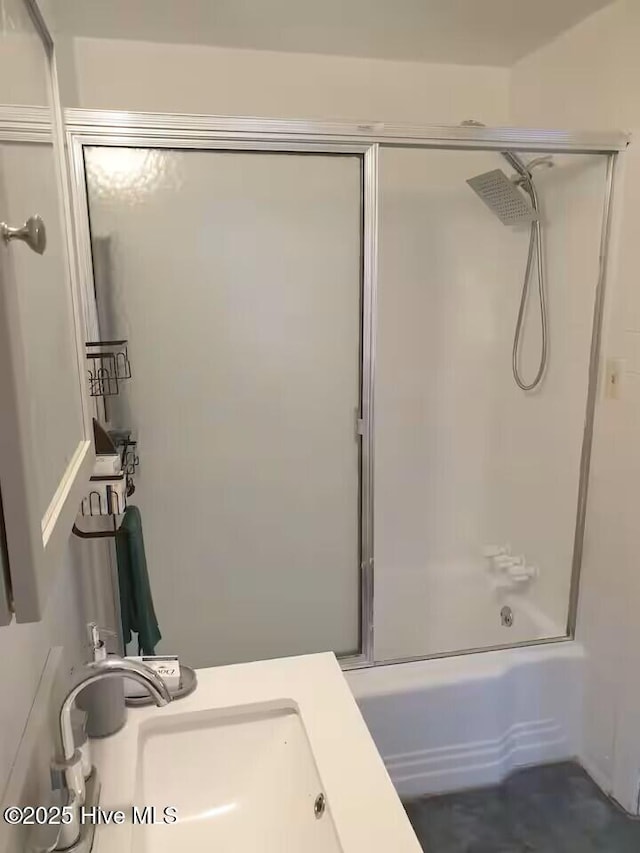 300 Moye Ave NW, Wilson, NC 27893 - full bathroom featuring combined bath / shower with glass door and vanity