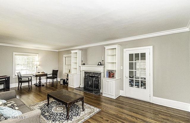 300 Moye Ave NW, Wilson, NC 27893 - living area featuring crown molding, dark wood-type flooring, and a premium fireplace