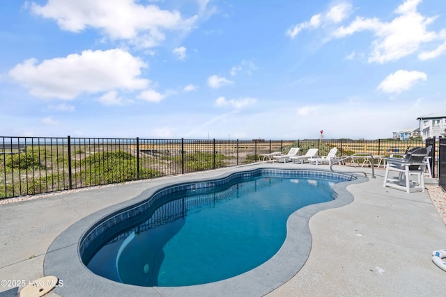 505 Caswell Beach Rd, Caswell Beach, NC 28465 - view of swimming pool with fence, a patio area, and a fenced in pool