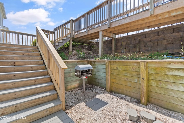 505 Caswell Beach Rd, Caswell Beach, NC 28465 - view of patio featuring stairs and a deck