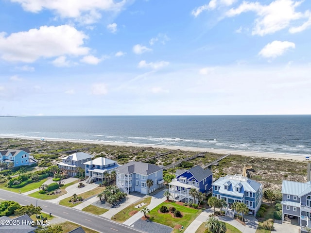 505 Caswell Beach Rd, Caswell Beach, NC 28465 - birds eye view of property with a beach view and a water view