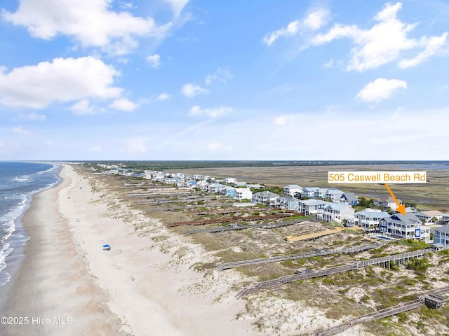 505 Caswell Beach Rd, Caswell Beach, NC 28465 - aerial view featuring a view of the beach and a water view