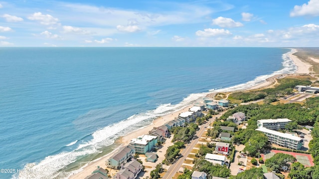 bird's eye view of waterfront with a beach