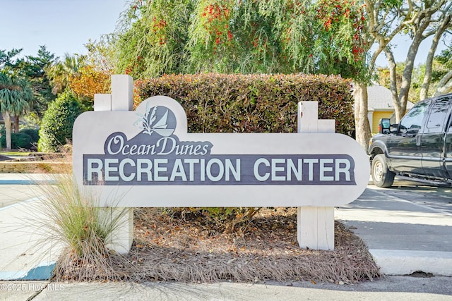 view of community sign