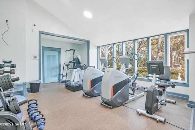 exercise room featuring lofted ceiling and recessed lighting