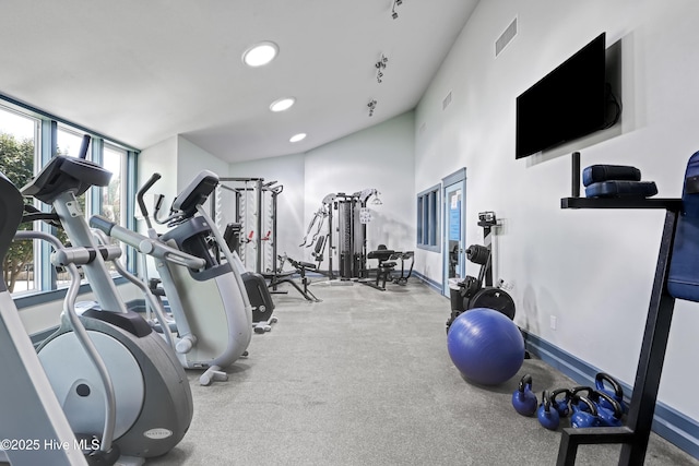 exercise room with recessed lighting